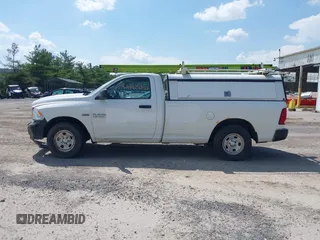 2014 Ram 1500 Tradesman with VIN 3C6JR7DT1EG278102, listed as a IAAI auction lot 42422647 with 118,797 mi miles and . Bid and sale history available at DreamBid. Image 14.