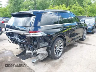 2020 Lincoln Aviator Grand Touring with VIN 5LMYJ8XY2LGL35999, listed as a IAAI auction lot 42344715 with 54,449 mi miles and . Bid and sale history available at DreamBid. Image 4.
