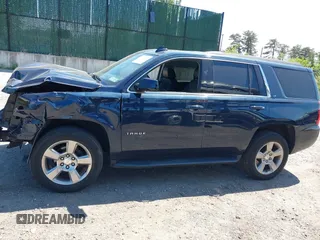 2020 Chevrolet Tahoe LT with VIN 1GNSKBKC6LR239081, listed as a IAAI auction lot 42298842 with 125,328 mi miles and . Bid and sale history available at DreamBid. Image 14.