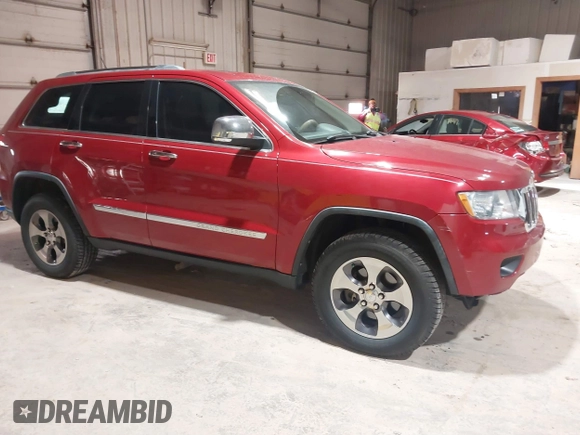 2011 Jeep Grand Cherokee Limited z VIN 1J4RR5GG7BC612091, wystawiony jako IAAI lot #41878511 z przebiegiem 127 114 mil mil oraz . Historia ofert i sprzedaży dostępna na DreamBid. Obrazek 1.