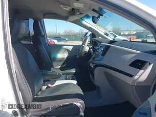 2014 Toyota Sienna SE with VIN 5TDXK3DC0ES477207, listed as a IAAI auction lot 41624619 with 213,881 mi miles and . Bid and sale history available at DreamBid. Image 5.