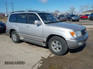 2001 Toyota Land Cruiser z VIN JTEHT05J412009507, wystawiony jako IAAI lot #41613080 z przebiegiem 288 987 mil mil oraz . Historia ofert i sprzedaży dostępna na DreamBid. Obrazek 1.