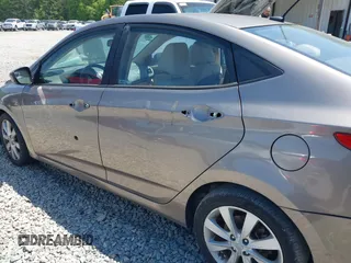2014 Hyundai Accent GLS with VIN KMHCU4AE7EU736691, listed as a IAAI auction lot 42054514 with 80,715 mi miles and . Bid and sale history available at carsss.com. Image 6.