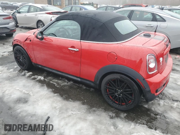 2015 MINI Roadster S z VIN WMWSY3C58FT567023, wystawiony jako Copart lot #43289505 z przebiegiem 115 029 mil mil oraz Szkoda całkowita • Salvage title. Historia ofert i sprzedaży dostępna na DreamBid. Obrazek 2.