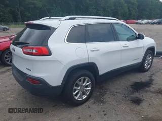 2016 Jeep Cherokee Latitude z VIN 1C4PJMCB3GW237461, wystawiony jako IAAI lot #42495278 z przebiegiem 102 417 mil mil oraz . Historia ofert i sprzedaży dostępna na DreamBid. Obrazek 4.