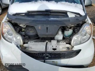 2015 Smart fortwo Passion z VIN WMEEJ3BA8FK790317, wystawiony jako Copart lot #71124392 z przebiegiem Nie podano mil oraz Szkody całkowita. Historia ofert i sprzedaży dostępna na DreamBid. Obrazek 11.