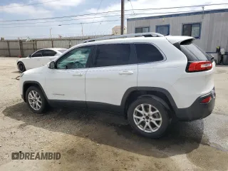 2016 Jeep Cherokee Altitude with VIN 1C4PJLCB4GW216385, listed as a Copart auction lot 57459925 with 154,521 mi miles and Clean title. Bid and sale history available at DreamBid. Image 2.