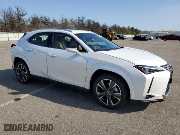 2025 Lexus UX with VIN JTHUCJDH6S2007491, listed as a Copart auction lot 52997175 with 1,042 mi miles and Salvage Title. Bid and sale history available at carsss.com. Image 4.