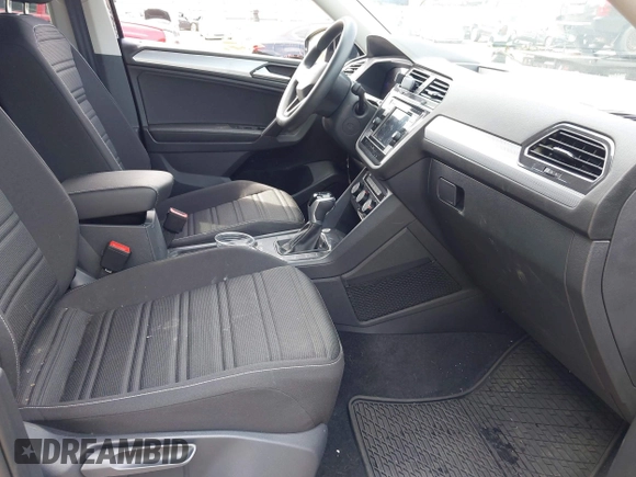 2023 Volkswagen Tiguan S with VIN 3VVRB7AX6PM108735, listed as a IAAI auction lot 42108217 with 13,279 mi miles and . Bid and sale history available at DreamBid. Image 5.