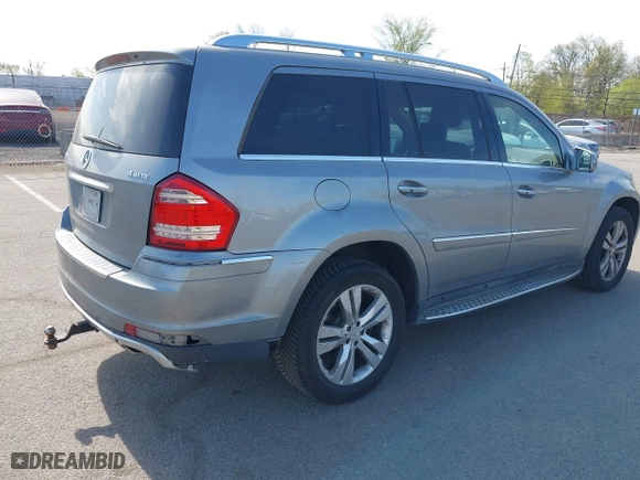 2011 Mercedes-Benz GL-Class GL 450 with VIN 4JGBF7BE3BA740269, listed as a IAAI auction lot 42098338 with 146,055 mi miles. Bid and sale history available at carsss.com. Image 4.