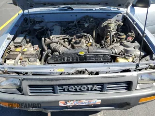 1991 Toyota Pickup z VIN JT4RN13PXM6031833, wystawiony jako Copart lot #58953095 z przebiegiem 252 237 mil mil oraz Czysty tytuł • Clean title. Historia ofert i sprzedaży dostępna na DreamBid. Obrazek 11.