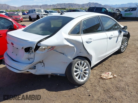 2014 Ford Fiesta SE with VIN 3FADP4BJ9EM133473, listed as a IAAI auction lot 42118460 with 107,705 mi miles and . Bid and sale history available at DreamBid. Image 4.