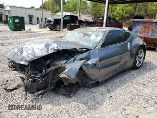 2012 Nissan 370Z z VIN JN1AZ4EH4CM562967, wystawiony jako Copart lot #52359755 z przebiegiem Nie podano mil oraz Szkody całkowita. Historia ofert i sprzedaży dostępna na DreamBid. Obrazek 1.
