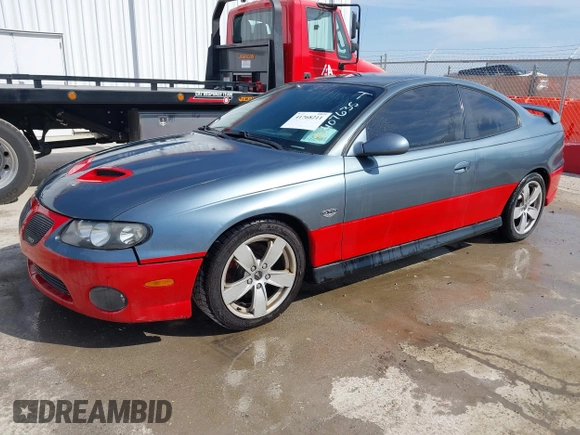 2005 Pontiac GTO with VIN 6G2VX12UX5L407635, listed as a IAAI auction lot 41768211 with 82,365 mi miles. Bid and sale history available at carsss.com. Image 2.