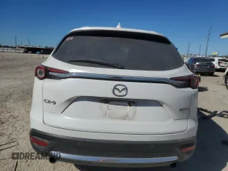 2021 Mazda CX-9 Grand Touring with VIN JM3TCADYXM0507401, listed as a Copart auction lot 89394535 with 69,506 mi miles and Salvage title. Bid and sale history available at DreamBid. Image 6.