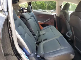 2024 Tesla Model Y z VIN 7SAYGDED2RA329802, wystawiony jako Copart lot #57748805 z przebiegiem 19 391 mil mil oraz Szkoda całkowita • Salvage title. Historia ofert i sprzedaży dostępna na DreamBid. Obrazek 11.