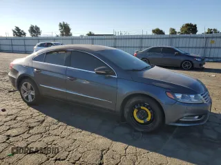 2013 Volkswagen CC Sport with VIN WVWBP7ANXDE525051, listed as a Copart auction lot 70659744 with 293,611 mi miles and Salvage Title. Bid and sale history available at DreamBid. Image 4.