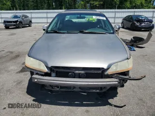 2000 Honda Accord EX с VIN 1HGCG1651YA085715, выставлен на аукционе Copart как лот 56040745 с пробегом 316 369 миль миль и Списание • Salvage title. История ставок и продаж доступна на DreamBid. Изображение 5.