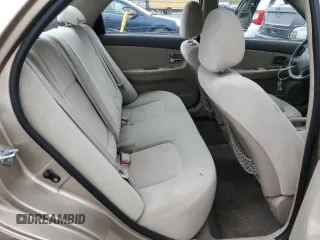 2009 Kia Spectra EX with VIN KNAFE221795600329, listed as a Copart auction lot 49205774 with 251,191 mi miles and Salvage Title. Bid and sale history available at carsss.com. Image 10.