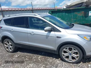 2017 Ford Escape Titanium with VIN 1FMCU0J99HUB23567, listed as a IAAI auction lot 42127795 with 93,056 mi miles. Bid and sale history available at carsss.com. Image 6.