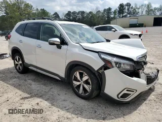 2019 Subaru Forester Touring with VIN JF2SKAWC6KH574974, listed as a Copart auction lot 51965885 with 82,157 mi miles and Salvage Title. Bid and sale history available at carsss.com. Image 4.