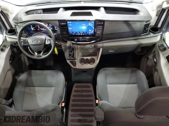 2023 Ford Transit Passenger XL with VIN 1FBAX2C85PKA93789, listed as a Copart auction lot 82843244 with 57,956 mi miles and Clean Title. Bid and sale history available at DreamBid. Image 8.