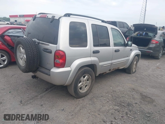 2003 Jeep Liberty Limited z VIN 1J8GL58K23W726252, wystawiony jako IAAI lot #42035004 z przebiegiem 224 159 mil mil oraz . Historia ofert i sprzedaży dostępna na DreamBid. Obrazek 4.