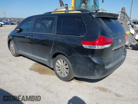 2013 Toyota Sienna XLE with VIN 5TDDK3DC8DS051928, listed as a IAAI auction lot 41857402 with 175,839 mi miles and . Bid and sale history available at DreamBid. Image 3.