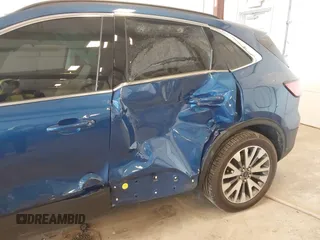 2022 Ford Escape Titanium Hybrid z VIN 1FMCU9DZ9NUA38627, wystawiony jako IAAI lot #42288647 z przebiegiem 54 802 mil mil oraz . Historia ofert i sprzedaży dostępna na DreamBid. Obrazek 6.