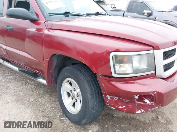 2006 Dodge Dakota SLT with VIN 1D7HE48KX6S598831, listed as a IAAI auction lot 41292884 with 173,181 mi miles and . Bid and sale history available at carsss.com. Image 6.