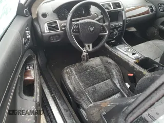 2014 Jaguar XK with VIN SAJWA4GB0ELB53770, listed as a Copart auction lot 74255294 with 0 mi miles and Salvage Title. Bid and sale history available at carsss.com. Image 8.