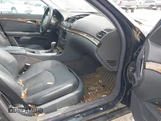 2004 Mercedes-Benz E-Class 5.0L with VIN WDBUF70J64A489519, listed as a IAAI auction lot 41675167 with 226,361 mi miles. Bid and sale history available at carsss.com. Image 5.