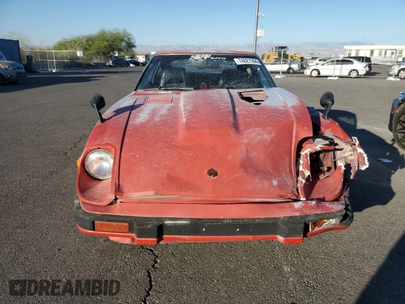 1983 Datsun 280ZX z VIN JN1HZ04S0DX569855, wystawiony jako Copart lot #74027594 z przebiegiem 12 300 mil mil oraz Szkody całkowita. Historia ofert i sprzedaży dostępna na DreamBid. Obrazek 5.