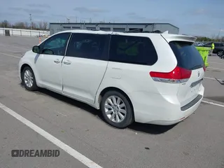 2011 Toyota Sienna XLE AAS with VIN 5TDYK3DC8BS085477, listed as a IAAI auction lot 41934541 with 131,768 mi miles and . Bid and sale history available at DreamBid. Image 3.