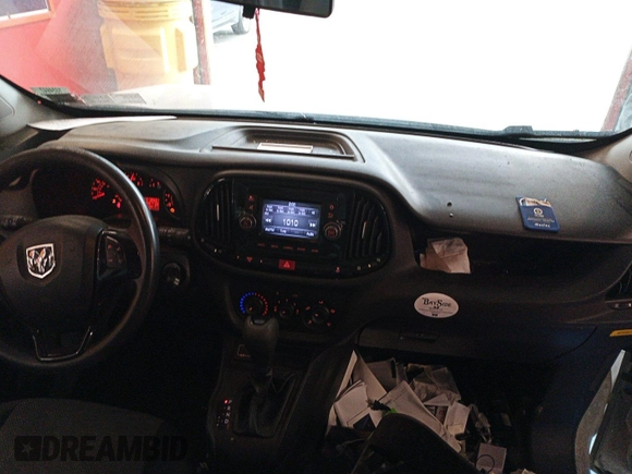 2019 Ram ProMaster City Cargo Tradesman z VIN ZFBHRFAB6K6M61931, wystawiony jako IAAI lot #42570041 z przebiegiem 152 309 mil mil oraz . Historia ofert i sprzedaży dostępna na DreamBid. Obrazek 6.