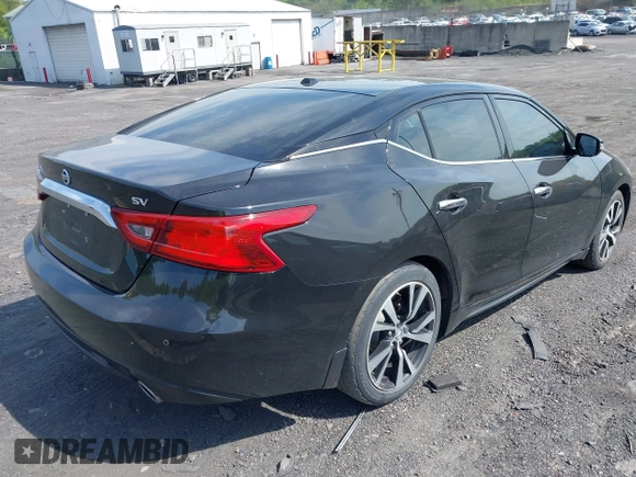 2018 Nissan Maxima SV with VIN 1N4AA6APXJC369633, listed as a IAAI auction lot 42256821 with 67,819 mi miles and . Bid and sale history available at DreamBid. Image 4.