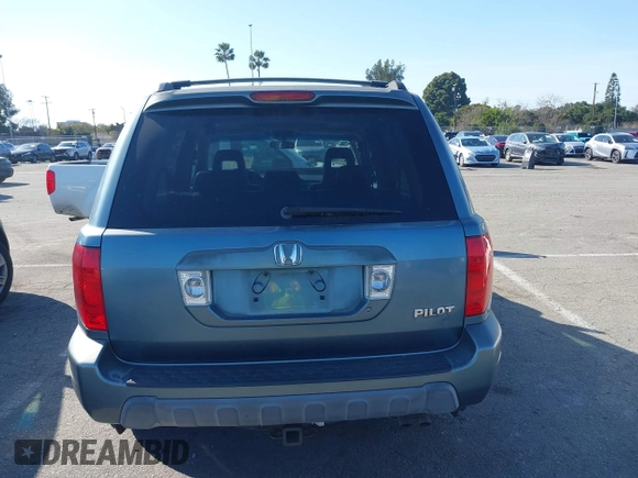 2005 Honda Pilot EX-L with VIN 2HKYF18565H534394, listed as a IAAI auction lot 41539630 with 168,384 mi miles. Bid and sale history available at carsss.com. Image 16.