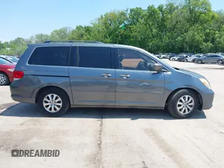 2010 Honda Odyssey EX-L z VIN 5FNRL3H76AB071871, wystawiony jako IAAI lot #42214867 z przebiegiem 255 116 mil mil oraz . Historia ofert i sprzedaży dostępna na DreamBid. Obrazek 13.