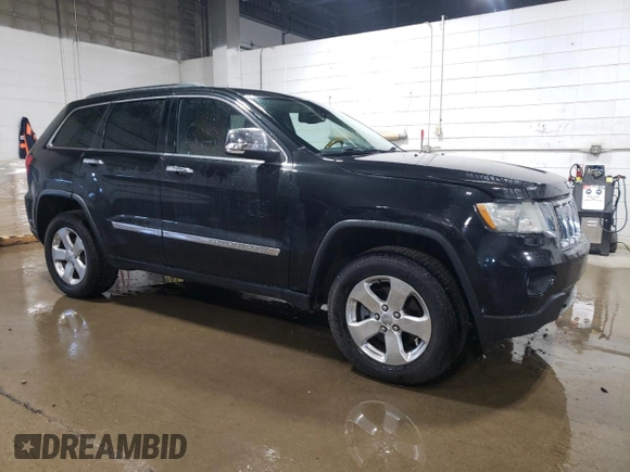 2013 Jeep Grand Cherokee Overland with VIN 1C4RJFCG7DC646348, listed as a Copart auction lot 49526415 with 137,889 mi miles and Clean Title. Bid and sale history available at carsss.com. Image 4.