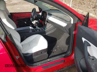 2021 Tesla Model Y Long Range with VIN 5YJYGDEE3MF212845, listed as a IAAI auction lot 41864260 with 43,451 mi miles. Bid and sale history available at carsss.com. Image 5.