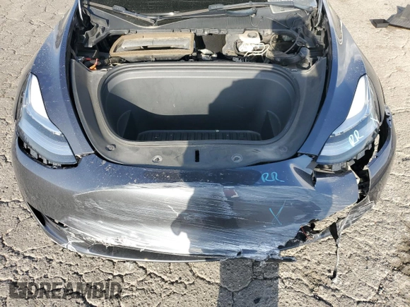 2021 Tesla Model Y Standard Range with VIN 5YJYGDED7MF109418, listed as a Copart auction lot 51590135 with 86,668 mi miles and Salvage Title. Bid and sale history available at DreamBid. Image 13.