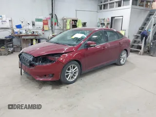 2015 Ford Focus SE with VIN 1FADP3F21FL270827, listed as a IAAI auction lot 42665015 with 162,745 mi miles and . Bid and sale history available at DreamBid. Image 18.