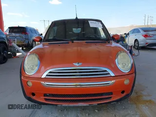2005 MINI Convertible with VIN WMWRF334X5TF61026, listed as a IAAI auction lot 42125720 with 117,908 mi miles and . Bid and sale history available at DreamBid. Image 13.