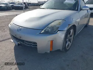 2006 Nissan 350Z Touring z VIN JN1AZ36A56M457175, wystawiony jako IAAI lot #41815565 z przebiegiem 155 869 mil mil oraz . Historia ofert i sprzedaży dostępna na DreamBid. Obrazek 6.