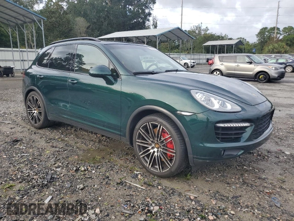 2012 Porsche Cayenne Turbo with VIN WP1AC2A25CLA80579, listed as a Copart auction lot 73360714 with 88,302 mi miles and Salvage title. Bid and sale history available at DreamBid. Image 4.