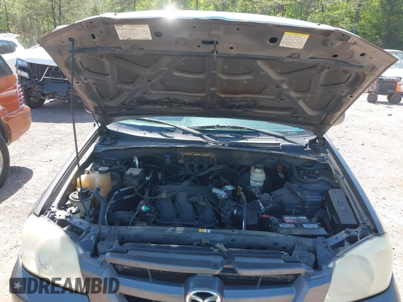 2005 Mazda Tribute S with VIN 4F2YZ04125KM04568, listed as a IAAI auction lot 41973671 with 244,117 mi miles and . Bid and sale history available at carsss.com. Image 10.