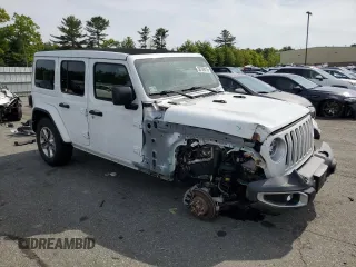 2020 Jeep Wrangler Unlimited Sahara with VIN 1C4HJXEG3LW243396, listed as a Copart auction lot 58709415 with 28,725 mi miles and Salvage title. Bid and sale history available at DreamBid. Image 4.