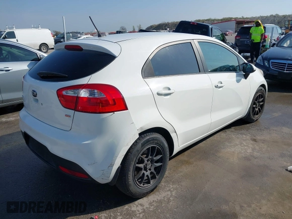 2015 Kia Rio LX with VIN KNADM5A39F6500074, listed as a IAAI auction lot 41871224 with 126,209 mi miles. Bid and sale history available at carsss.com. Image 4.