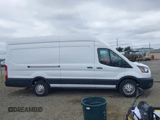 2024 Ford Transit Cargo z VIN 1FTBR3U86RKA14633, wystawiony jako IAAI lot #42500581 z przebiegiem 16 529 mil mil oraz . Historia ofert i sprzedaży dostępna na DreamBid. Obrazek 13.