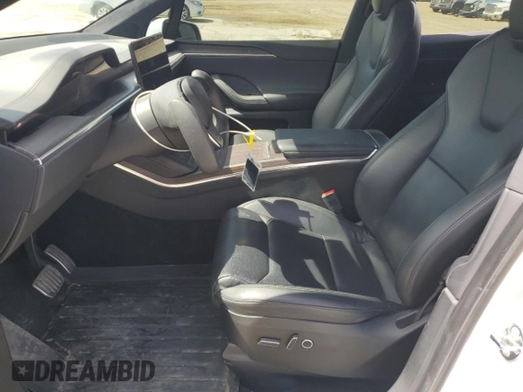 2022 Tesla Model X with VIN 7SAXCBE52NF362994, listed as a Copart auction lot 49850475 with 55,506 mi miles and Salvage Title. Bid and sale history available at DreamBid. Image 7.